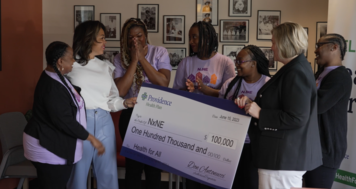 NXNE accepts donation check