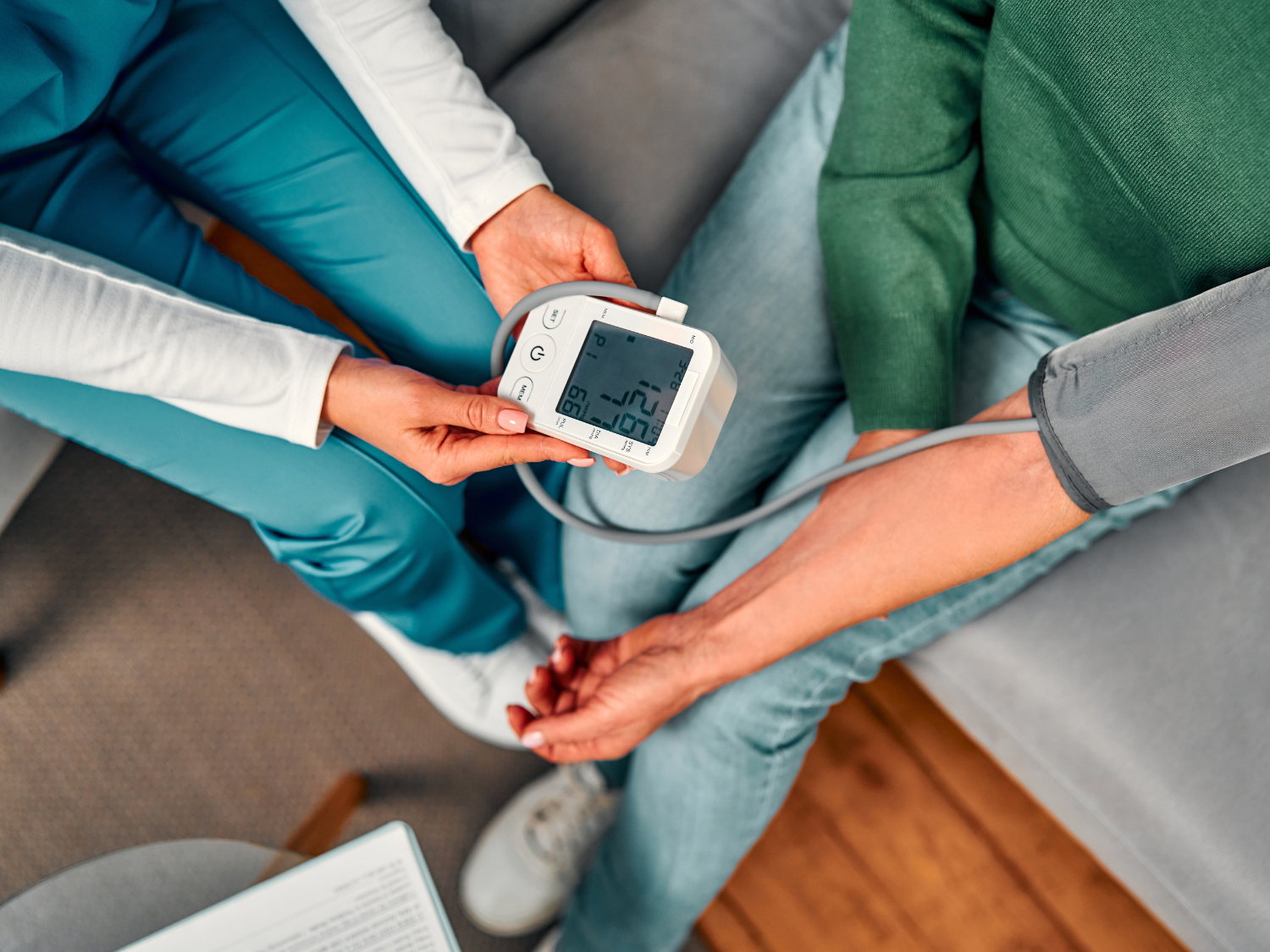 A patient having their blood pressure measured