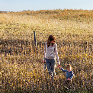 mother and child in a field