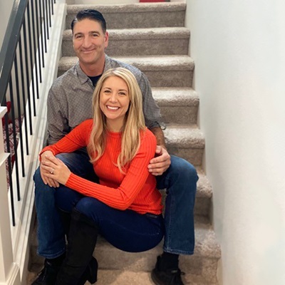 A couple sitting on the stairs