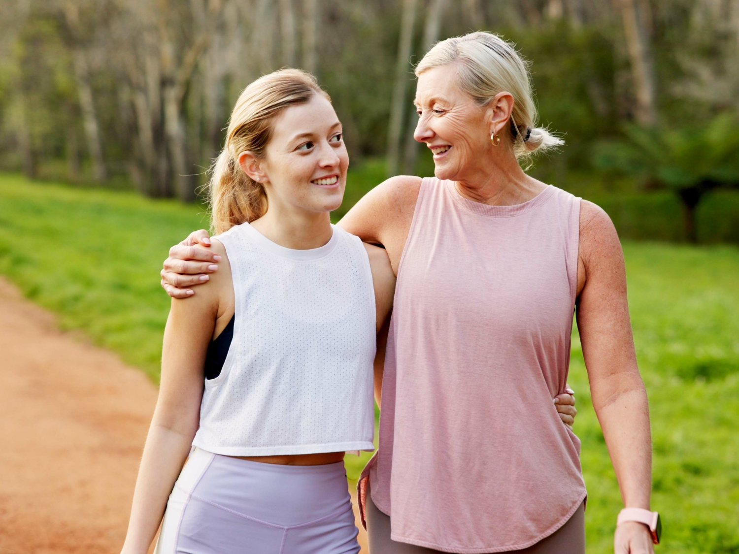 Mother and daughter walking together