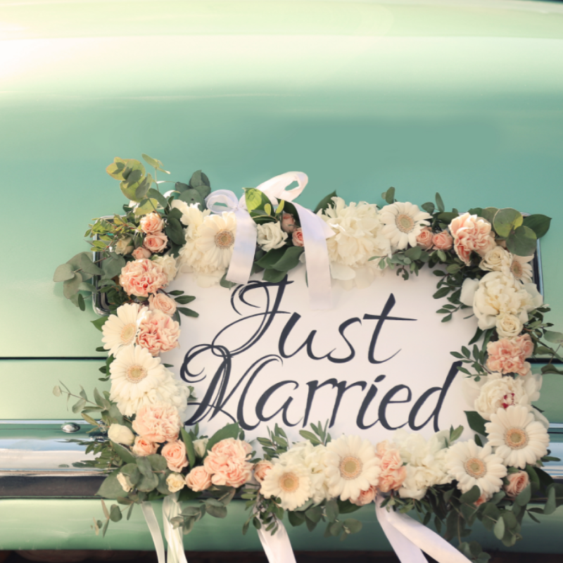 just married sign on car bumper
