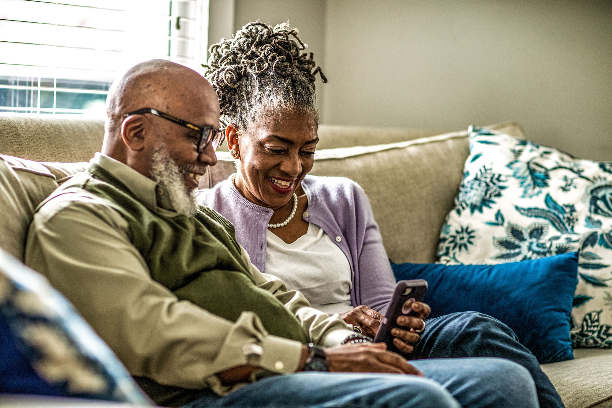 Couple looking at smartphone