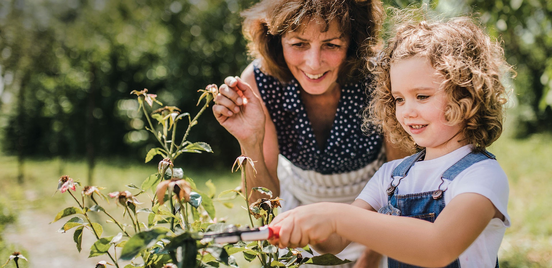 Mother and daughter in the garden