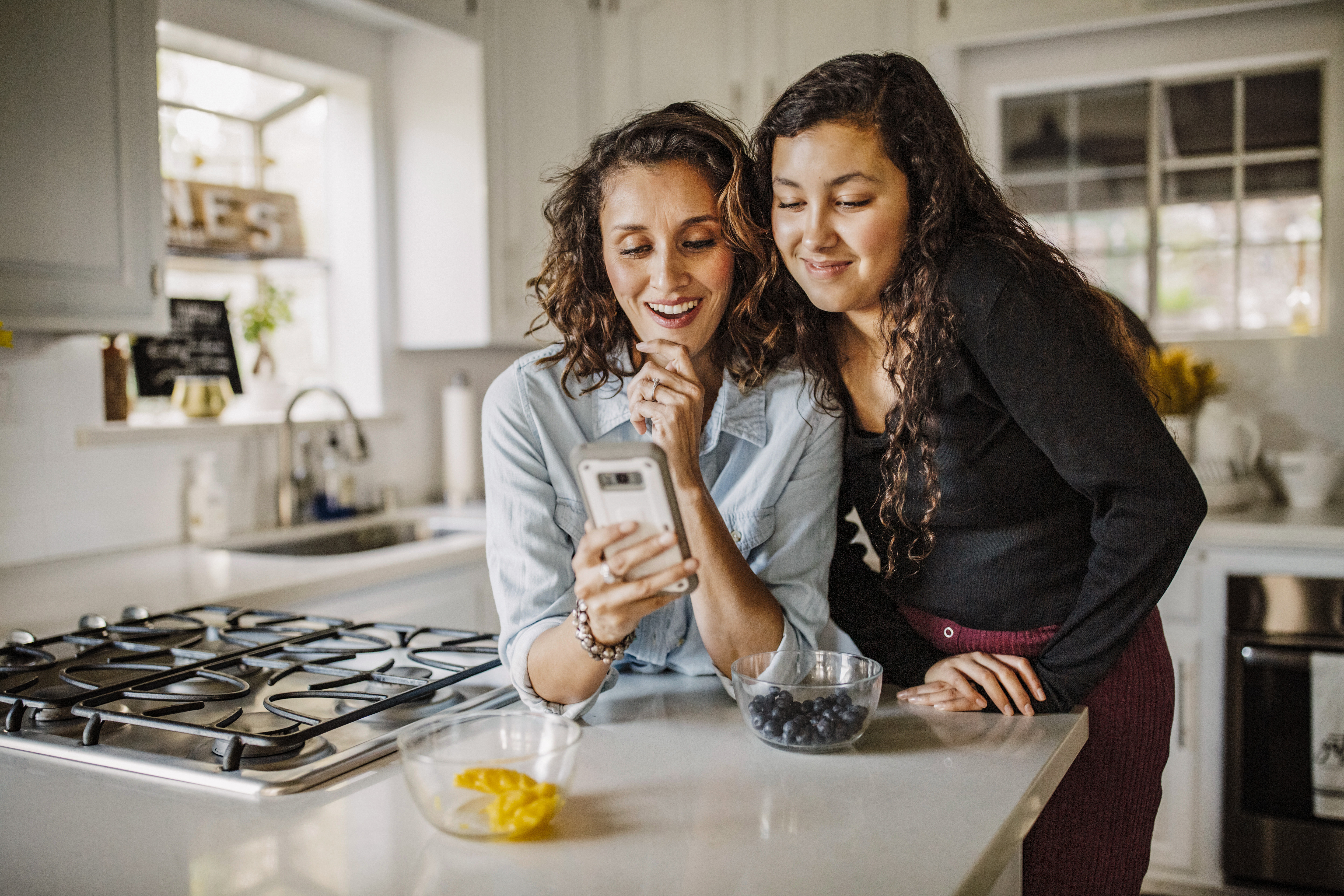 A mother and daughter FaceTiming