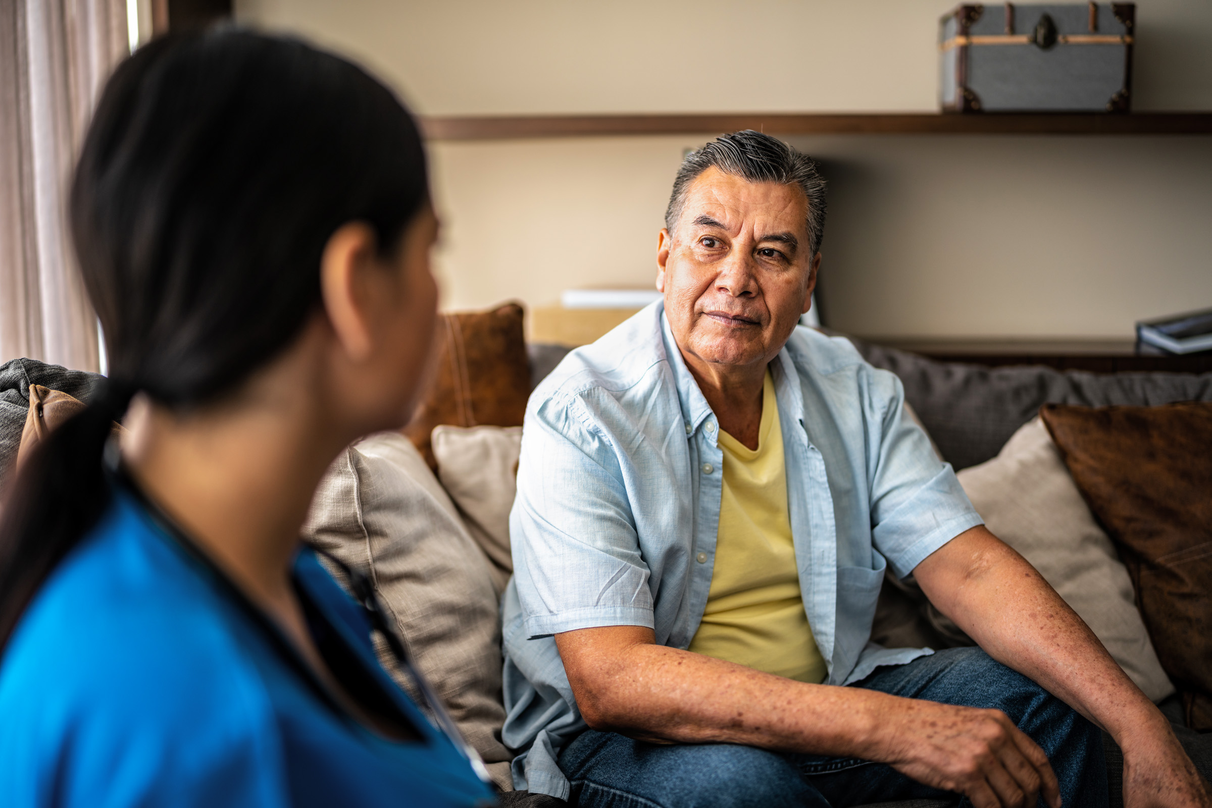 Doctor talking with patient