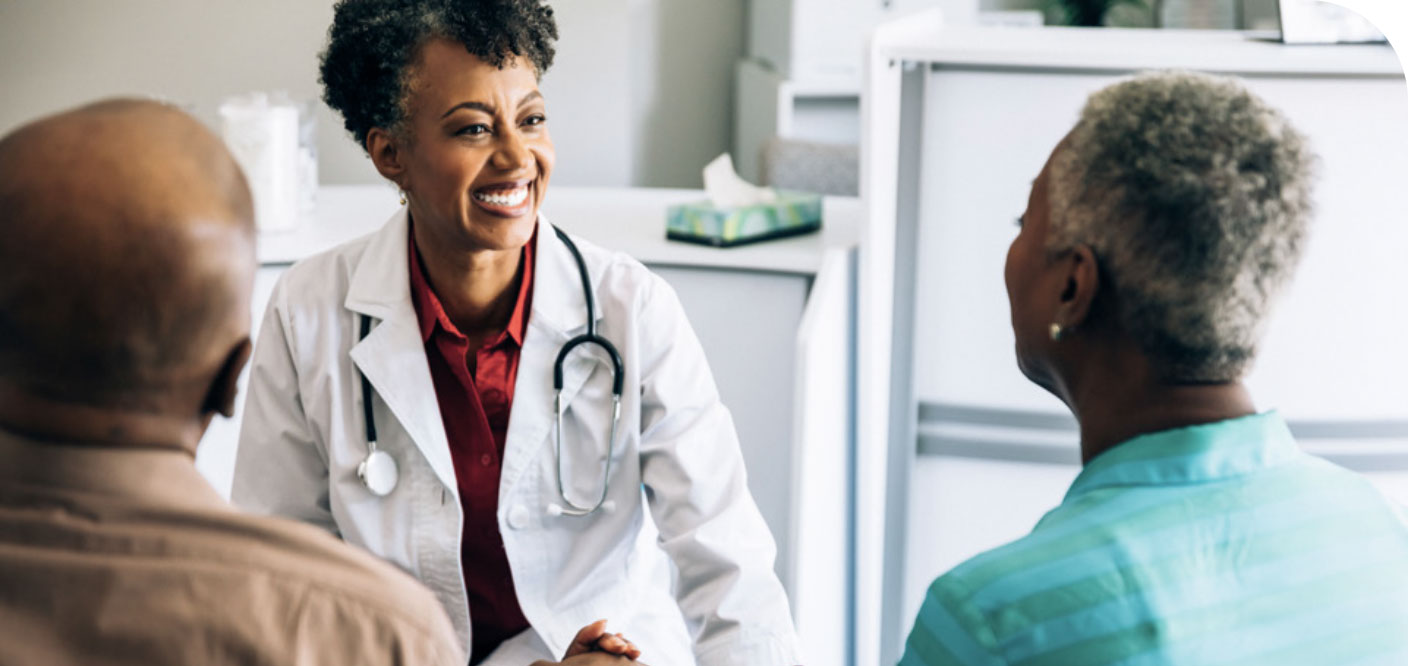 Couple talking with doctor